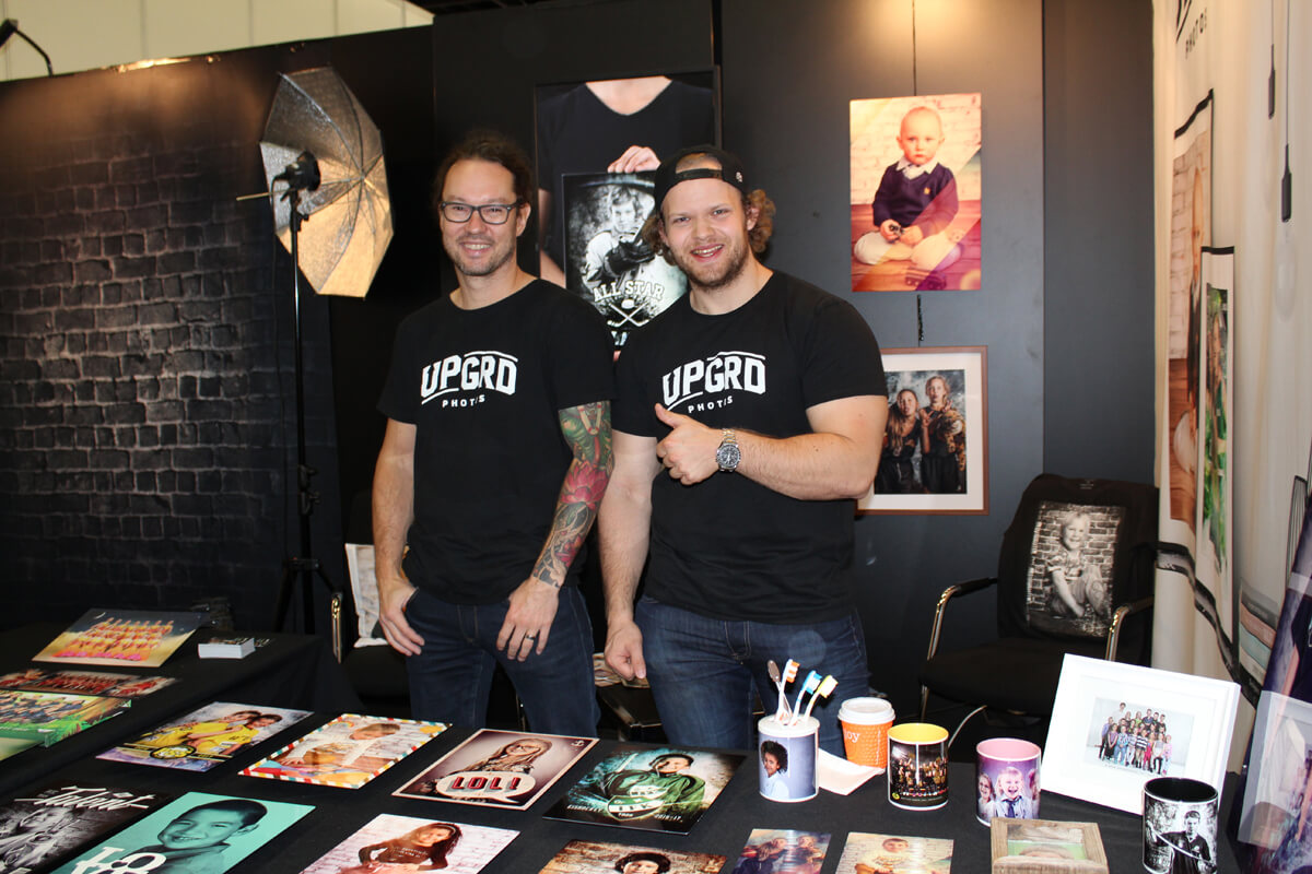 (PHOTO: Finntastic) Co-founder Matti Rajala and Head of Business Development & New Ventures Alex Günsberg from UPGRD Photos on their exhibition stand at the Photokina Fair 2016 in Cologne.